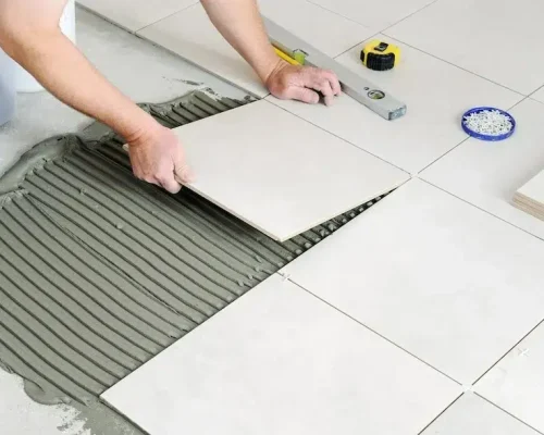Home 6 fpdl.in hands worker are laying ceramic tile floor 191163 2069 large 1